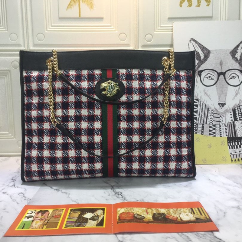 G*u*i shopping bags